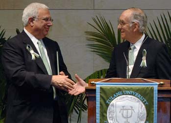 Board Chairman Phillip Greer congratulates President Scott Cowen